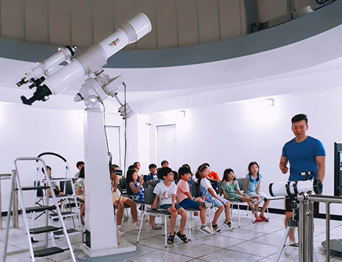 Photos of children by the observatory